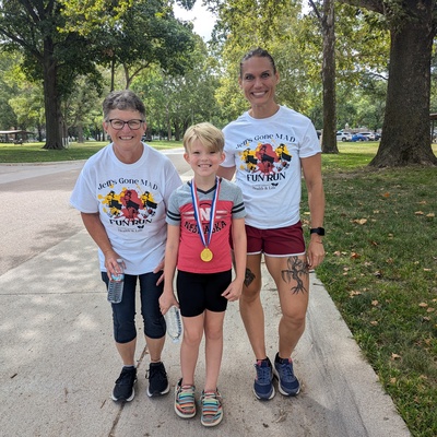 Helping with Fun Run to raise money for two local boys to obtain a service dog