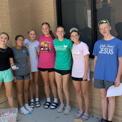 Decorating sidewalks for the first day of school at Central Elementary and Jefferson Intermediate