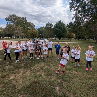 Helping with Fun Run to raise money for two local boys to obtain a service dog