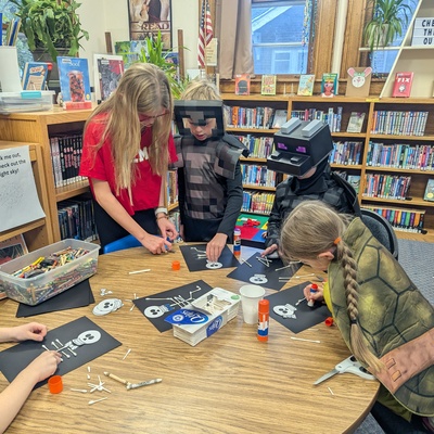 Helping out the Library at their Halloween Party