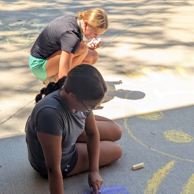 Decorating sidewalks for the first day of school at Central Elementary and Jefferson Intermediate