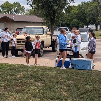 Helping with Fun Run to raise money for two local boys to obtain a service dog
