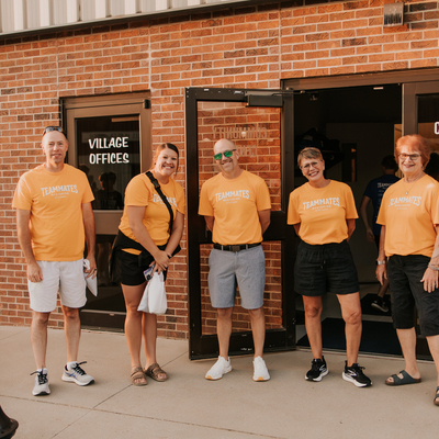 A group of mentors at the fun run fundraiser--we have 25+ TC staff who also mentor.